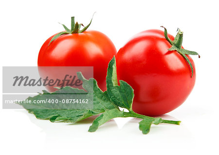 Red tomatoes with green leaf, isolated on white background