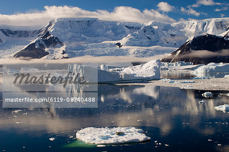Seal on the small iceberg on foreground, Gerlache Strait, Antarctic Peninsula, Antarctica, Polar Regions