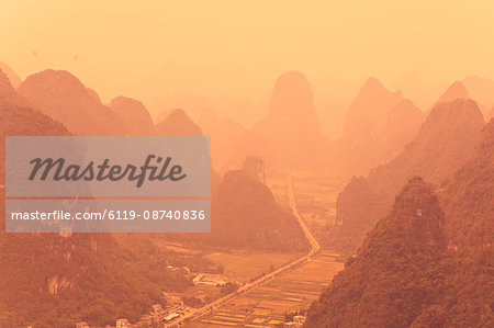 Karst landscape and morning haze, Yangshuo, Guangxi Province, China, Asia