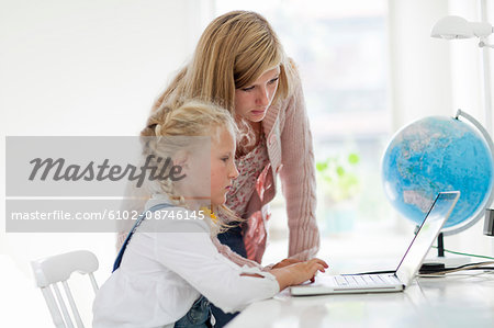 Girls using laptop