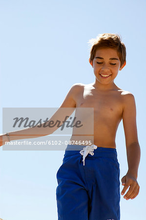 Boy playing on beach