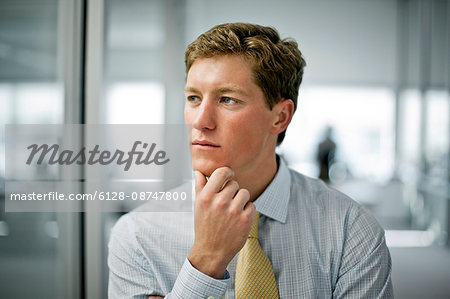 Young businessman in his office.