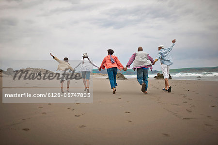 Family having fun at beach.