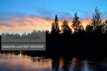 Romantic sunset on the river Pongoma. North Karelia, Russia