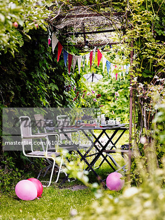 Table in garden ready for childrens party