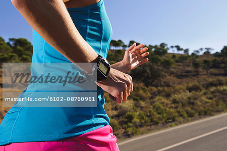 Woman jogging on road