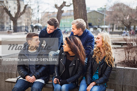 Teenagers sitting together