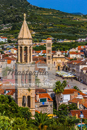 Overlooking St Mark's Church (left) and Main Square of Old Town of Hvar with St Stephen's Cathedral (right) on Hvar Island, Croatia Overlooking St Mark's Church (left) and Main Square of Old Town of Hvar with St Stephen's Cathedral (right) on Hvar Island, Croatia