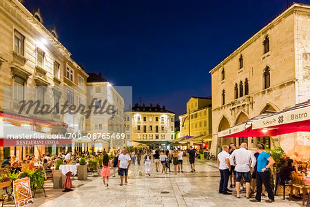 People sightseeing in the People's Square in the Old Town of Split in Split-Dalmatia County, Croatia