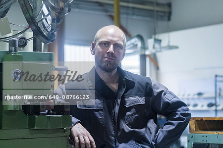 Portrait of worker in grinding workshop