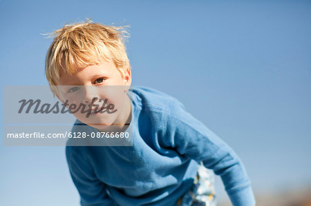 Portrait of preschool age boy at the beach.