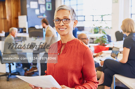 Portrait smiling businesswoman in office