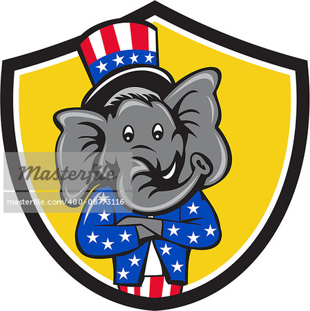 Illustration of an American Republican GOP elephant mascot arms crossed wearing usa stars and stripes top hat and suit viewed from front set inside shield crest on isolated background done in cartoon style.