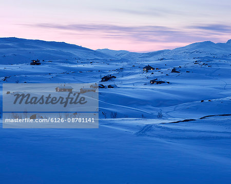 Sweden, Lapland, Riksgransen, Winter landscape at dusk