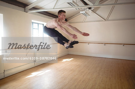 Ballerino practising ballet dance in the studio