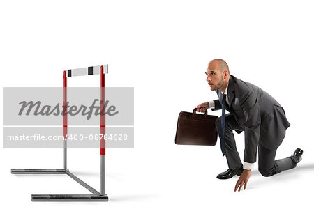 Businessman ready to race looks an obstacle