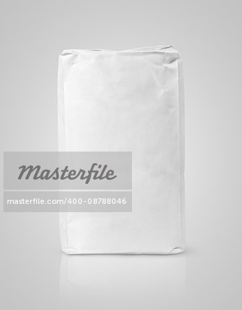 Blank white paper bag package of flour on gray background with clipping path