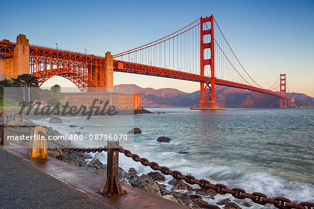 Image of Golden Gate Bridge in San Francisco, California during sunrise.