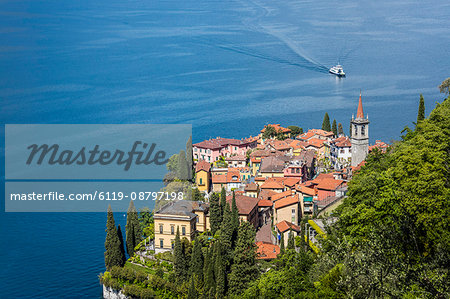 The typical village of Varenna surrounded by the blue water of Lake Como and gardens, Province of Lecco, Italian Lakes, Lombardy, Italy, Europe