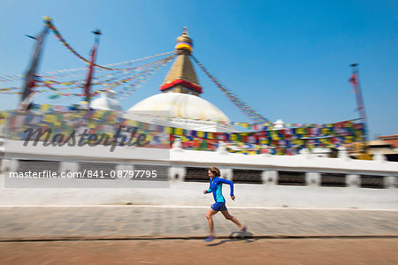 Marathon Ultra Runner Lizzy Hawker running around Bouddha (Boudhanath) (Bodnath) Stupa in Kathmandu, Nepal, Asia