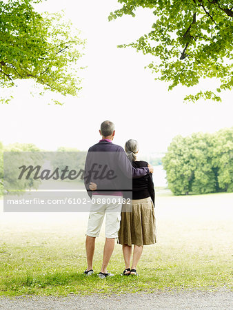 Senior couple standing in park