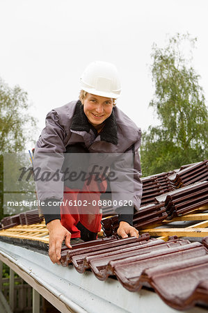 A young man roofing, Sweden.