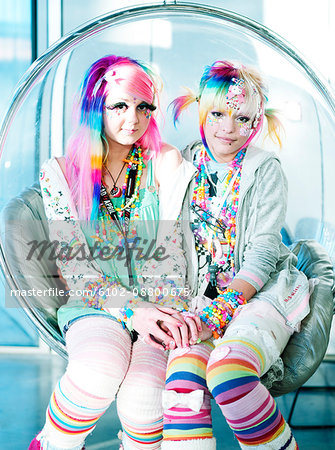 Portrait of two teenage girls in creative outfits, Sweden.