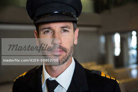 Portrait of pilot at the airport terminal