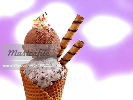 Chocolate and Cookie ice cream cone against white/purple background