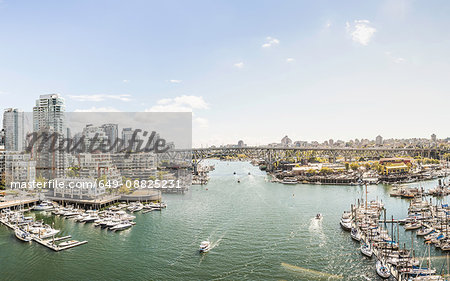 Elevated view of harbour, bridge and marina yachts, Vancouver, Canada