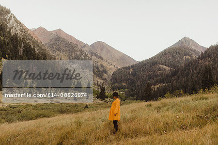 Woman standing in rural setting, Mineral King, Sequoia National Park, California, USA