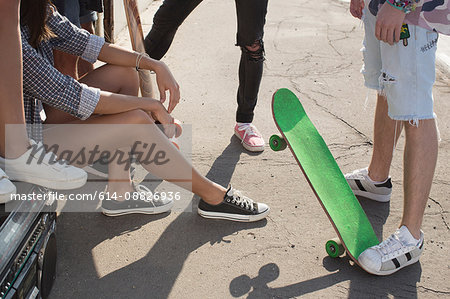 Skateboarders standing and talking, Budapest, Hungary