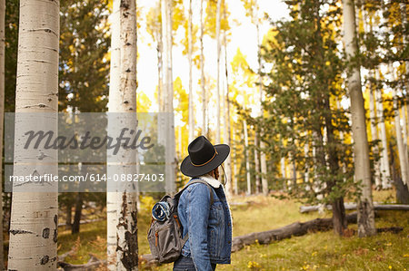 Woman in rural setting, looking at view, Flagstaff, Arizona, USA