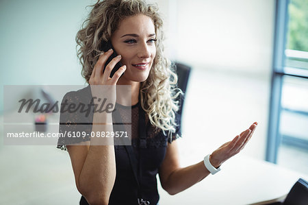 Businesswoman talking on mobile phone