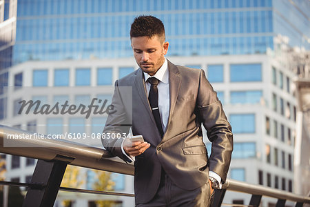 Businessman using mobile phone