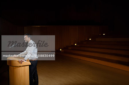 Male business executive giving a speech