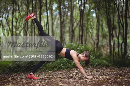 Woman performing stretching exercise