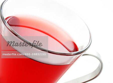 Red tea glass close up, soft focus