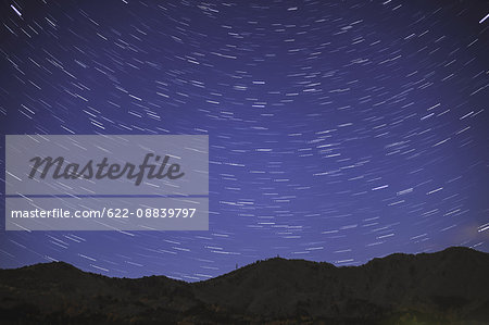 Stars in the night sky over a hill, Yamanashi Prefecture, Japan