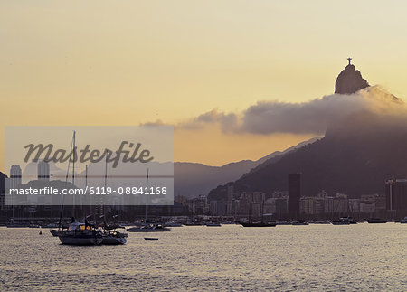 Sunset over Botafogo Bay and Corcovado Mountain viewed from Urca, Rio de Janeiro, Brazil, South America