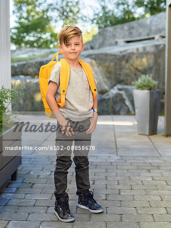Smiling boy with backpack