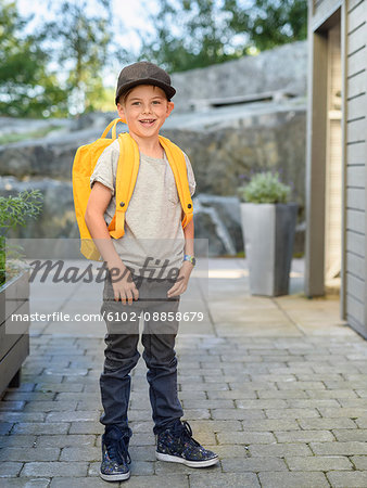 Smiling boy with backpack