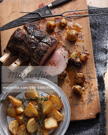 Roast beef with roast potatoes and onions