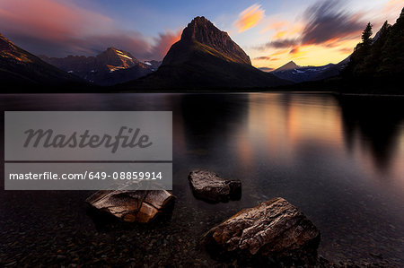 Scenic view at sunset, Swiftcurrent Lake, Glacier National Park, Montana, USA