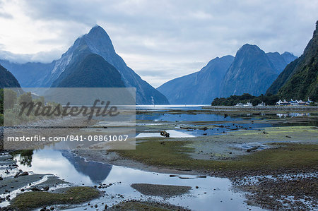 View of Milford Sound at low tide, Mitre Peak reflected in pool, Milford Sound, Fiordland National Park, UNESCO World Heritage Site, Southland, South Island, New Zealand, Pacific
