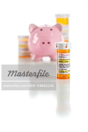 Piggy Bank and Non-Proprietary Medicine Prescription Bottles Isolated on a White Background.
