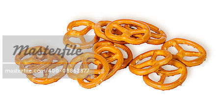 Pile crunchy pretzels with salt isolated on white background