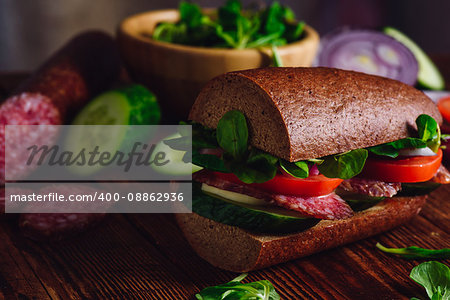 Sandwich with Rye Bread, Cheese and Fresh Vegetables. Close up.
