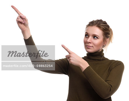 Beautiful girl pointing to the side. Woman showing product. Isolated on white background.