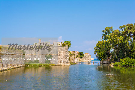 Moat and walls of the Venetian Castle of Agia Mavra at the Greek island of Lefkada. The original building of the castle of Agia Mavra was constructed in 1300.